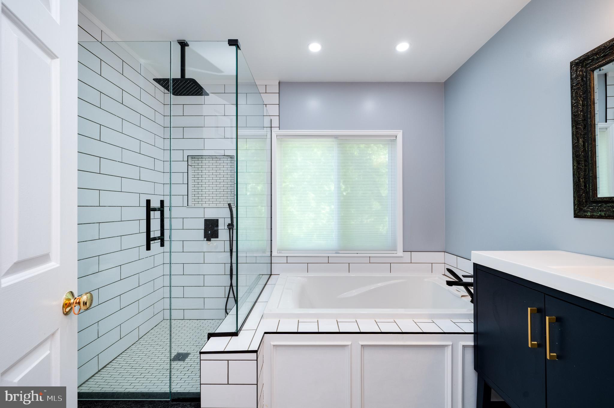 510 Greenhowe Drive Lititz, PA 17543 - Photo 24 of 31 a bathroom with a granite countertop sink a toilet and shower