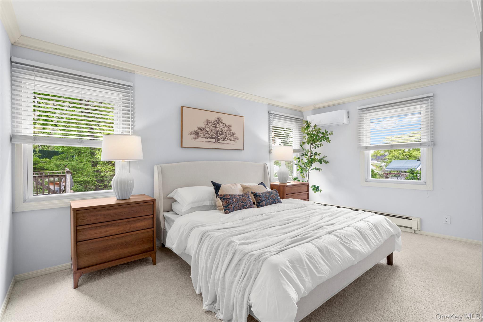 925 Old Boston Post Road Mamaroneck, NY 10543 - Photo 13 of 26 a bedroom with bed and a window