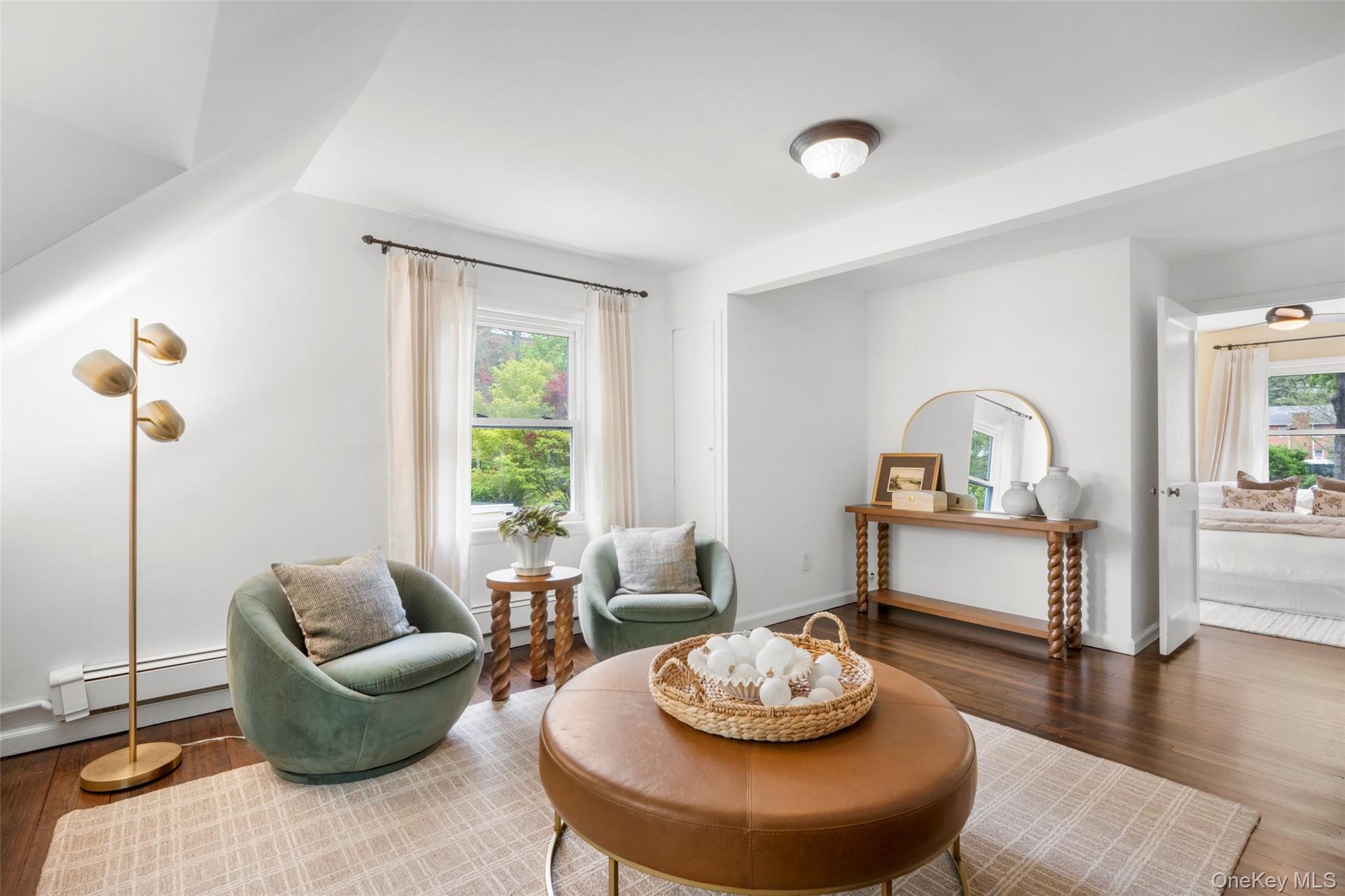 925 Old Boston Post Road Mamaroneck, NY 10543 - Photo 17 of 26 a living room with furniture and a wooden floor