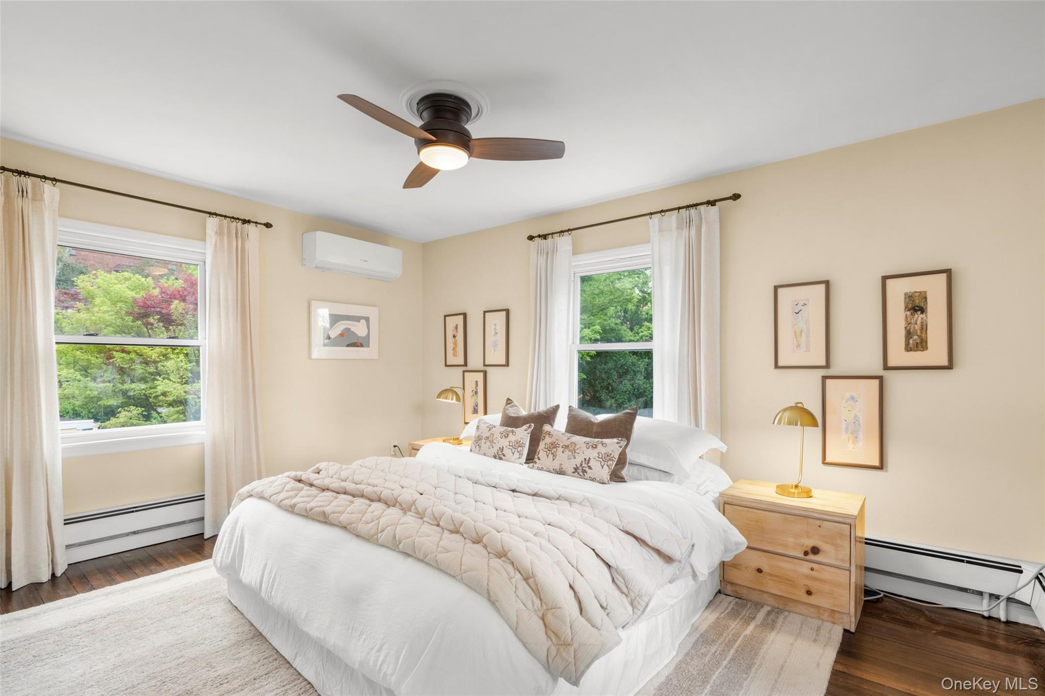 925 Old Boston Post Road Mamaroneck, NY 10543 - Photo 18 of 26 a bedroom with a large bed and a window