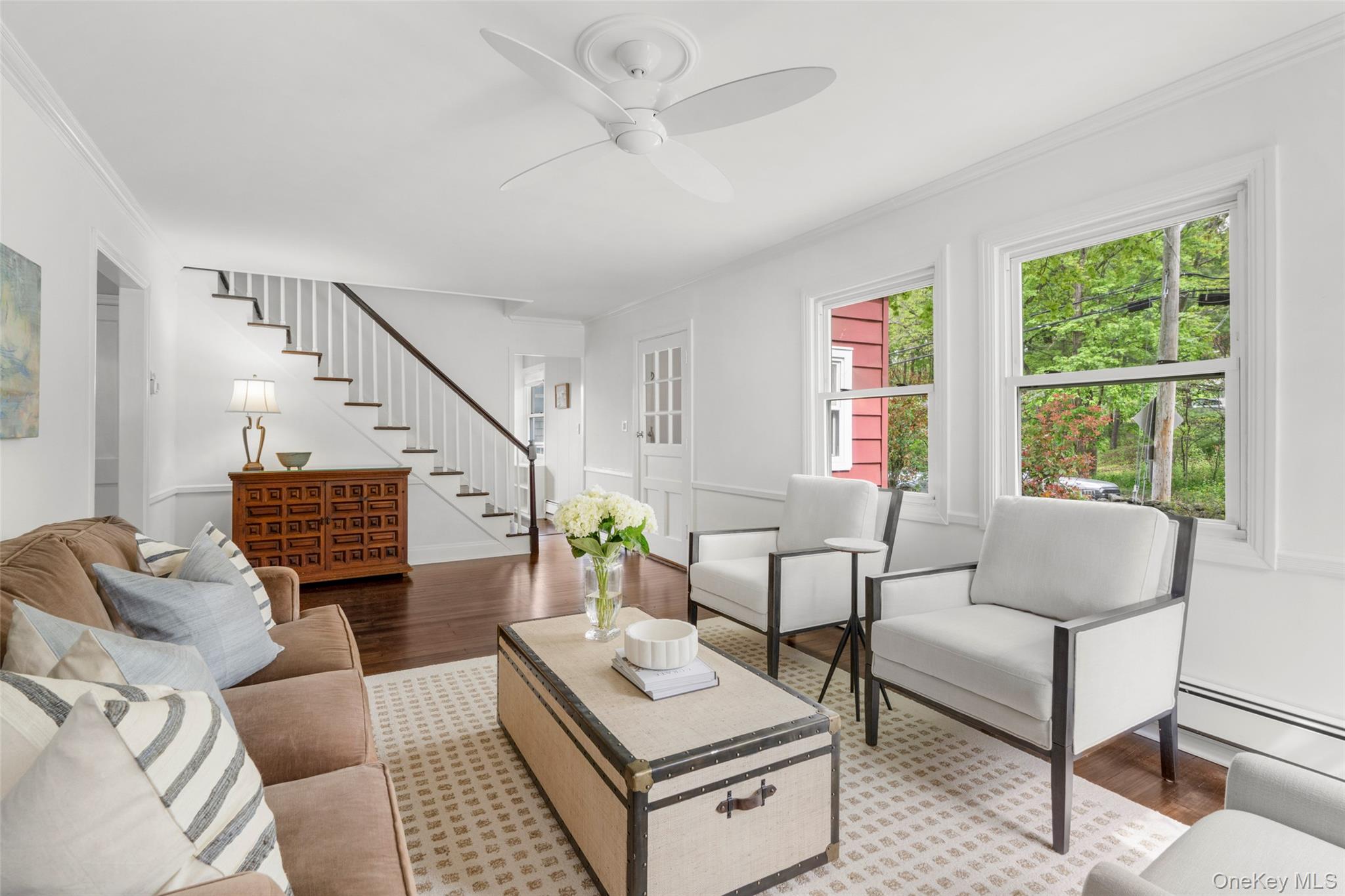 925 Old Boston Post Road Mamaroneck, NY 10543 - Photo 2 of 26 a living room with furniture and a table