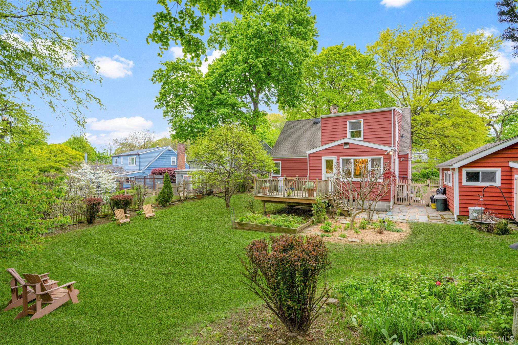 925 Old Boston Post Road Mamaroneck, NY 10543 - Photo 21 of 26 a view of a yard with table and chairs and a yard