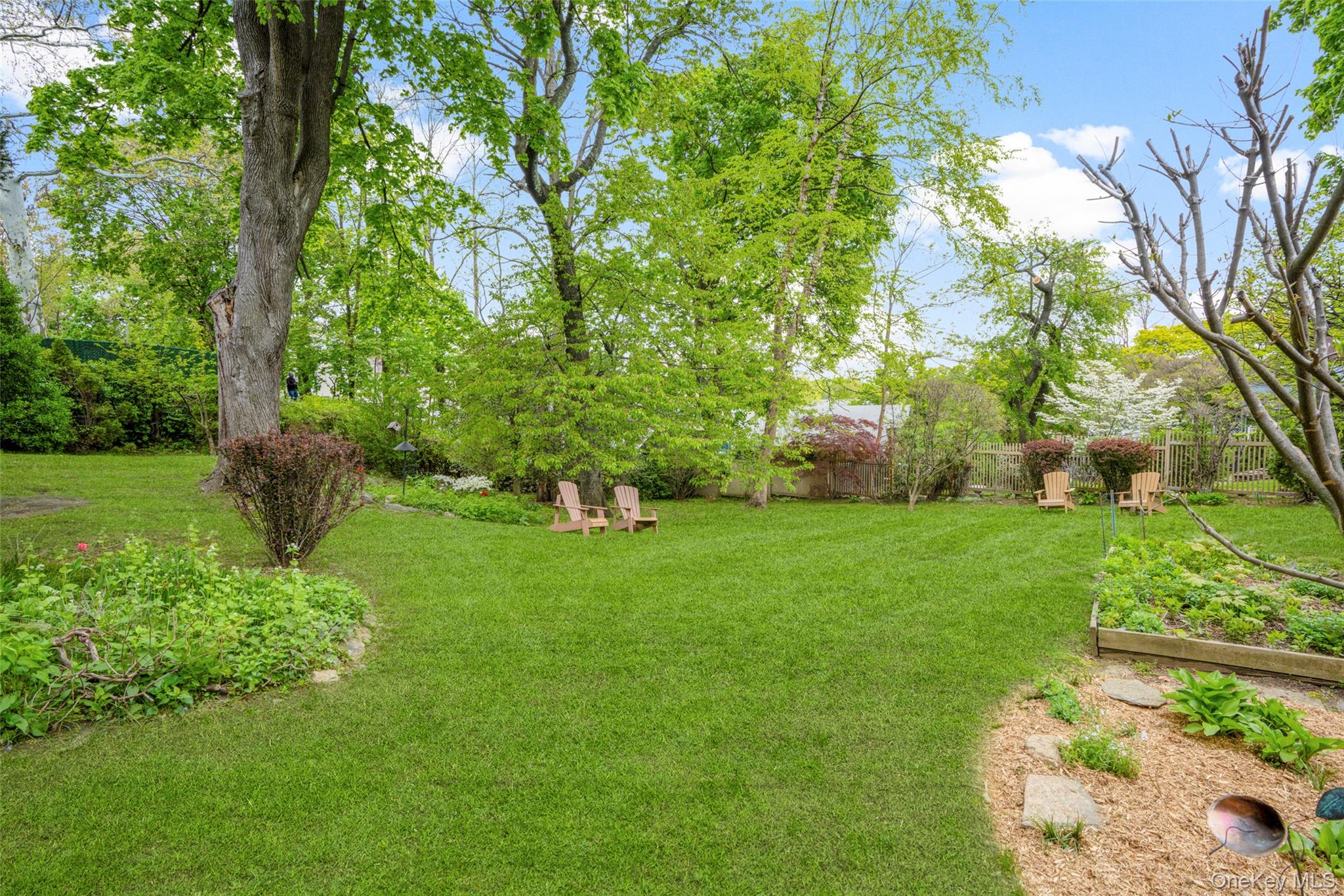 925 Old Boston Post Road Mamaroneck, NY 10543 - Photo 24 of 26 a green field with lots of trees