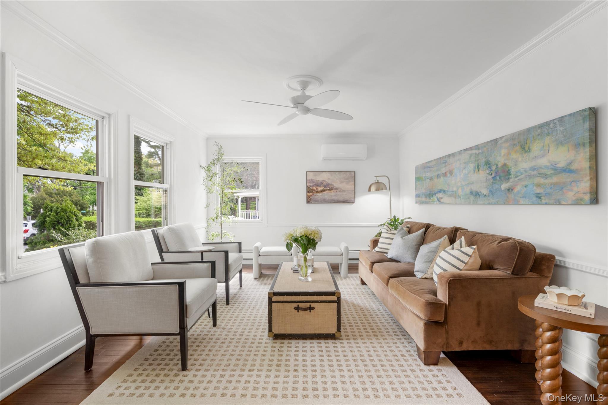 925 Old Boston Post Road Mamaroneck, NY 10543 - Photo 3 of 26 a living room with furniture and a window