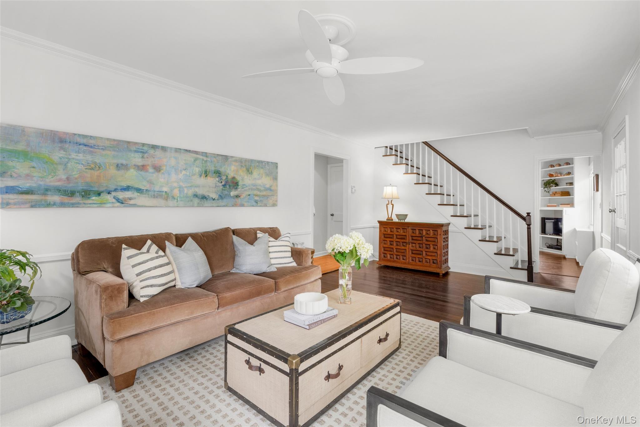 925 Old Boston Post Road Mamaroneck, NY 10543 - Photo 4 of 26 a living room with furniture and a potted plant