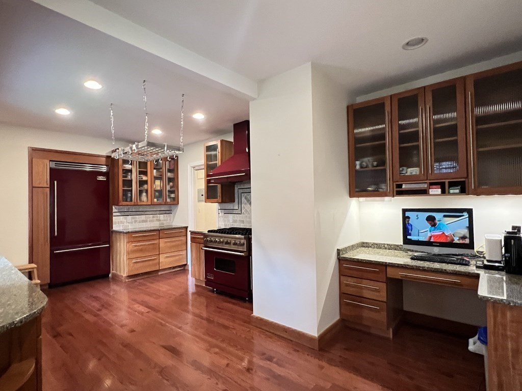 84 Winthrop Road Brookline, MA 02445 - Photo 23 of 42 a room with furniture and wooden floor