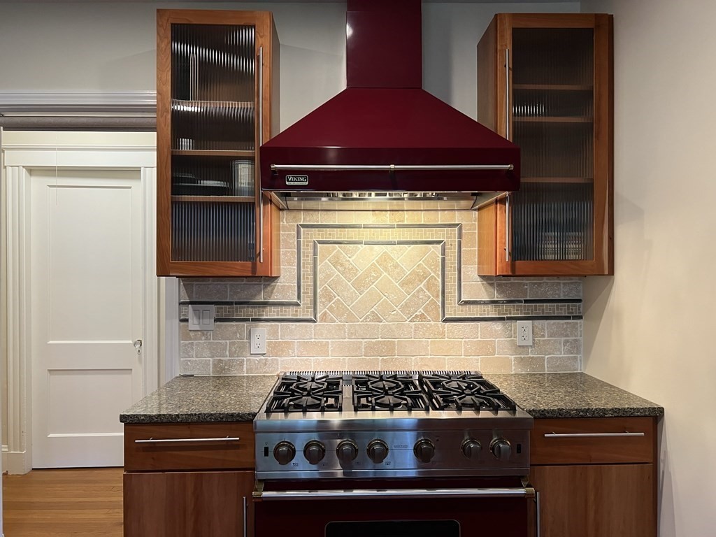 84 Winthrop Road Brookline, MA 02445 - Photo 27 of 42 a stove top oven sitting inside of a kitchen