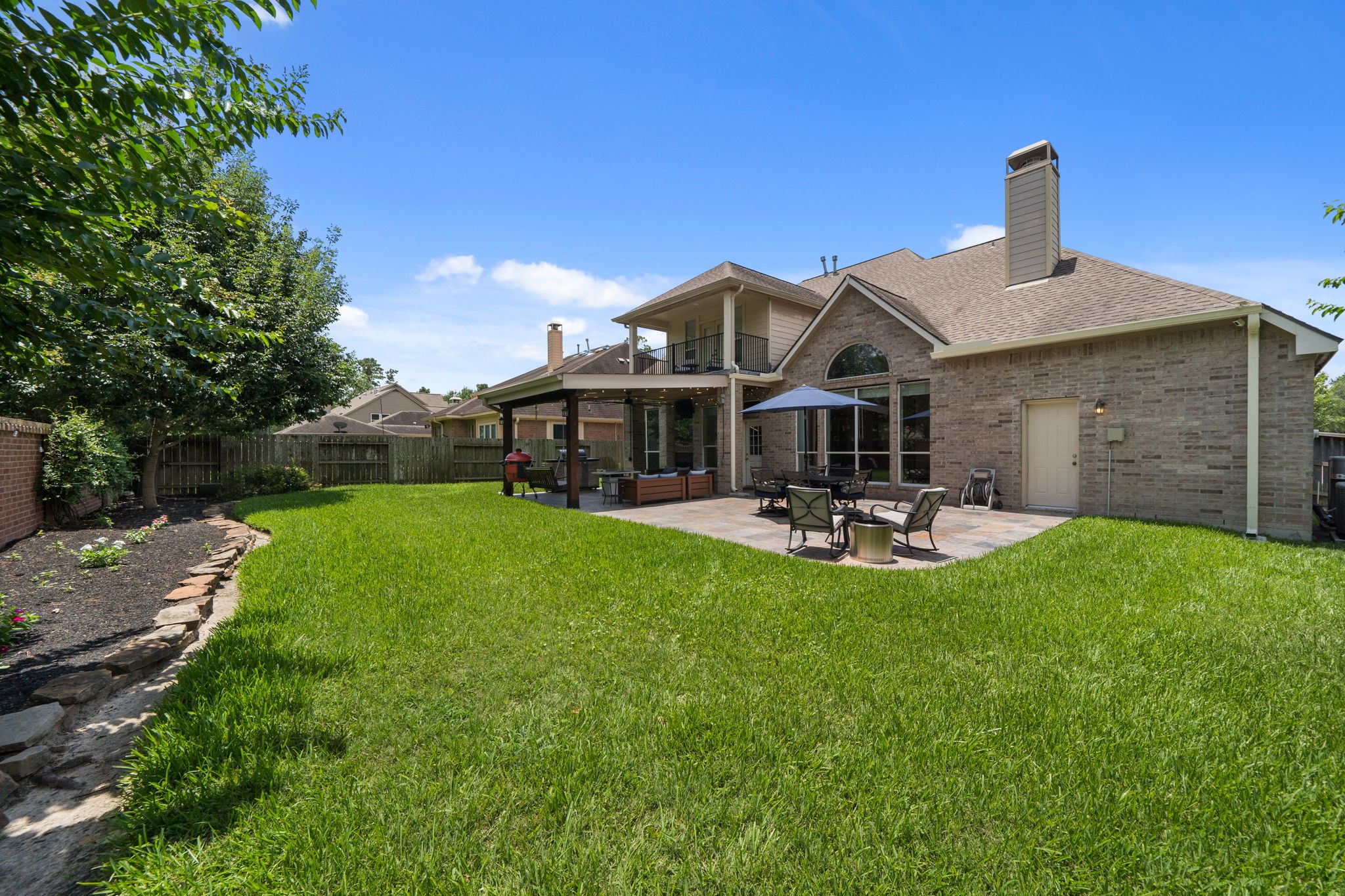 14718 Ramblebrook Humble, TX 77396 - Photo 27 of 38 Outdoor space designed for quiet evenings, play, or casual entertaining.