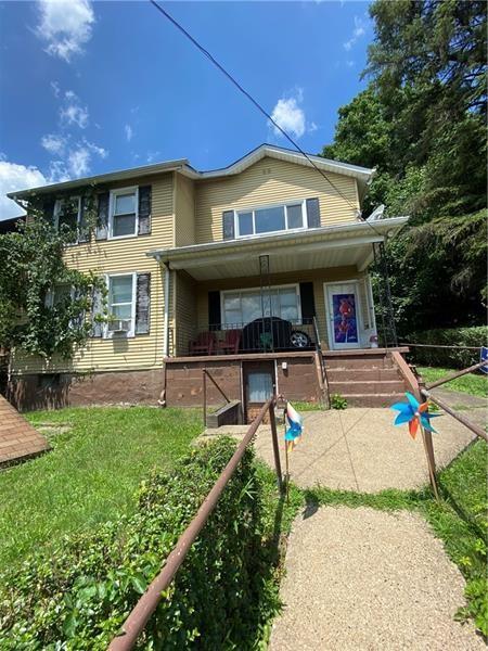 a view of a house with a swimming pool