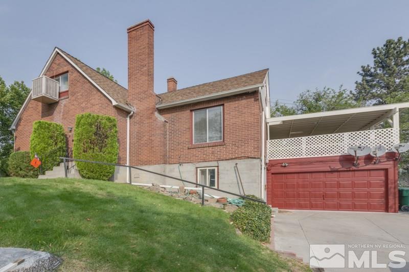 333 West 15th Street, Unit ABC Reno, NV 89503 - Photo 1 of 1 a view of a house with a yard and potted plants
