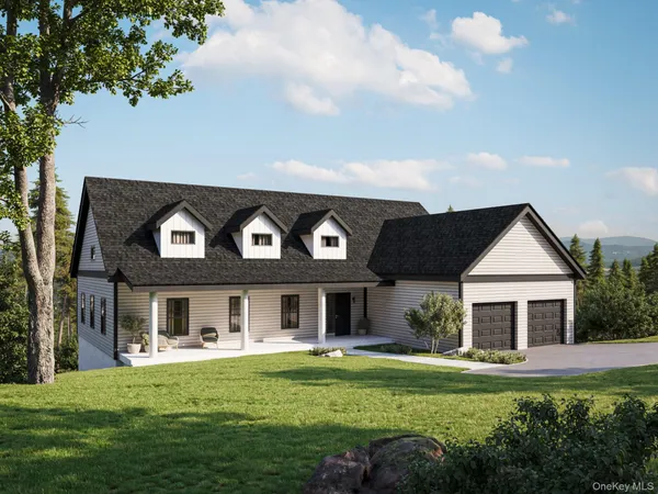 a front view of a house with a garden and porch