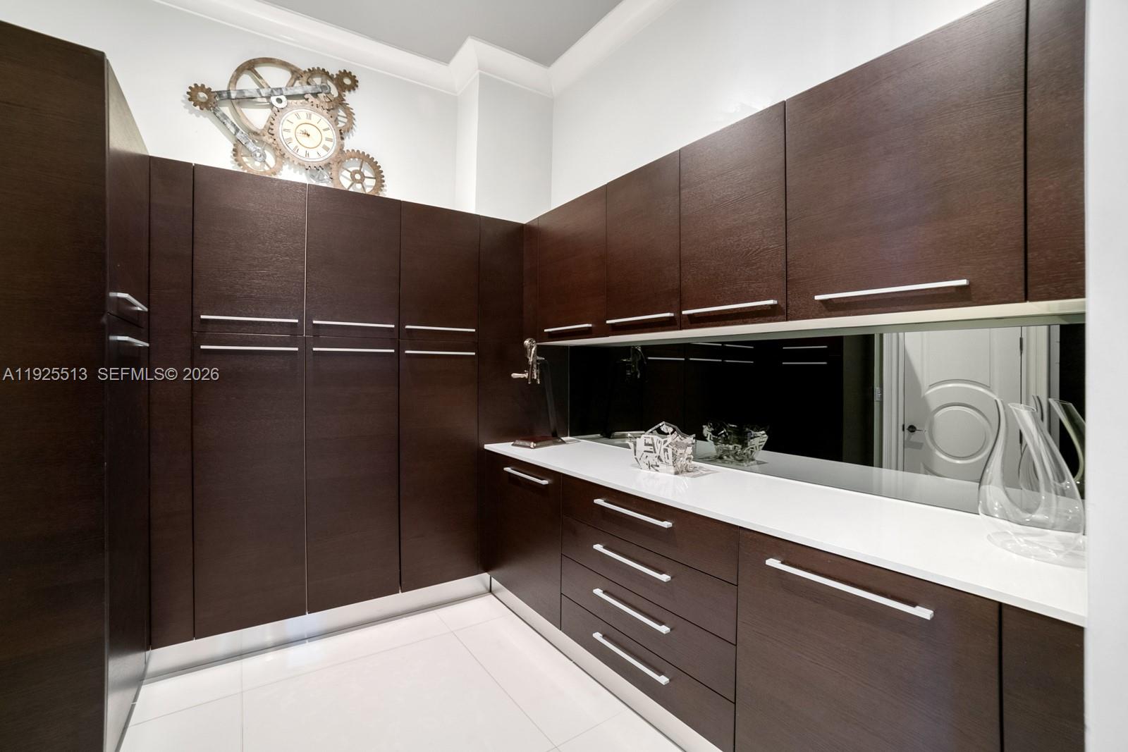 142 South Island Road Golden Beach, FL 33160 - Photo 43 of 55 a bathroom with a sink and a mirror