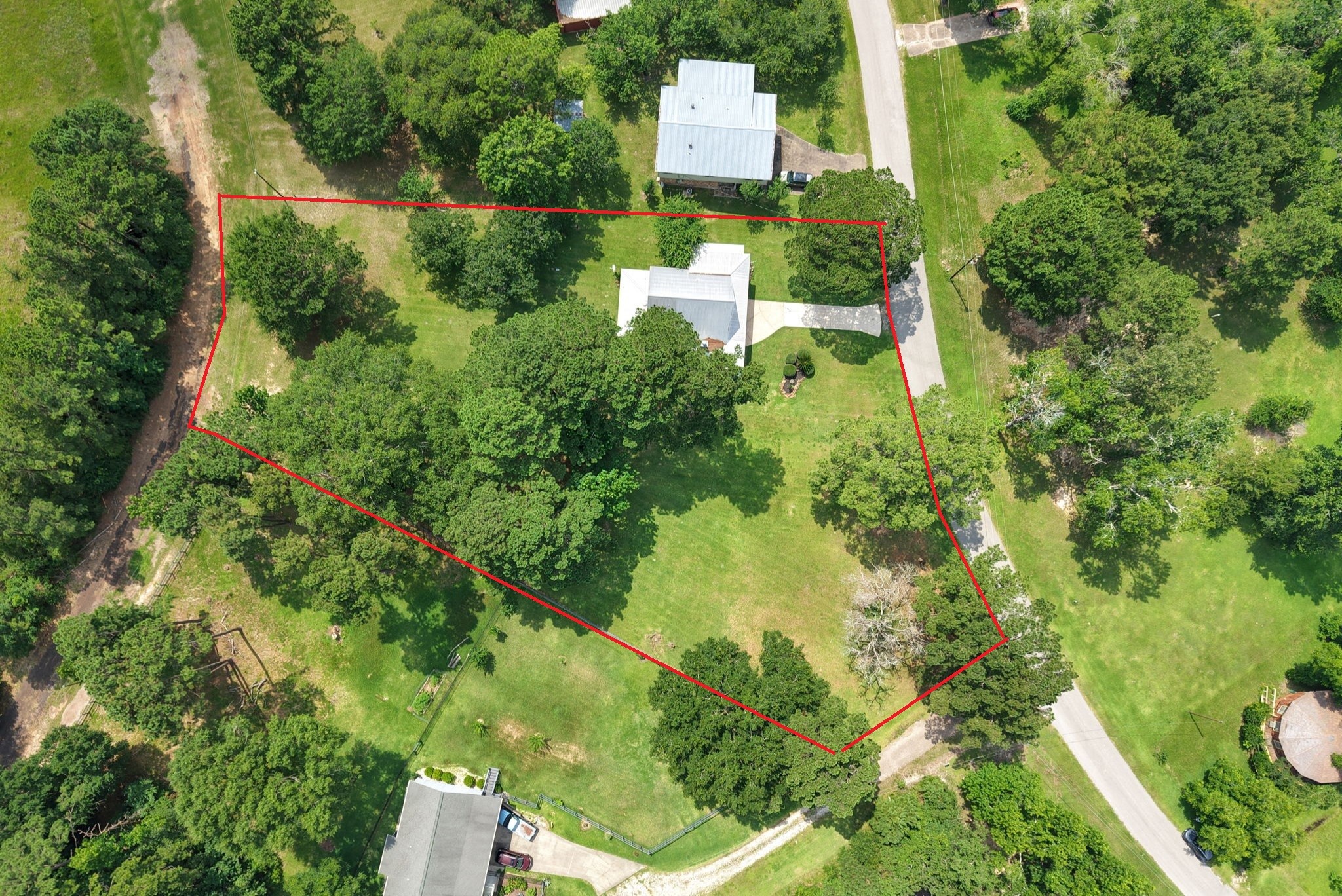 780 Hickory Ridge Drive Coldspring, TX 77331 - Photo 2 of 40 This home is situated on 1.12 with FIVE lots - estimated outline in red (survey required)