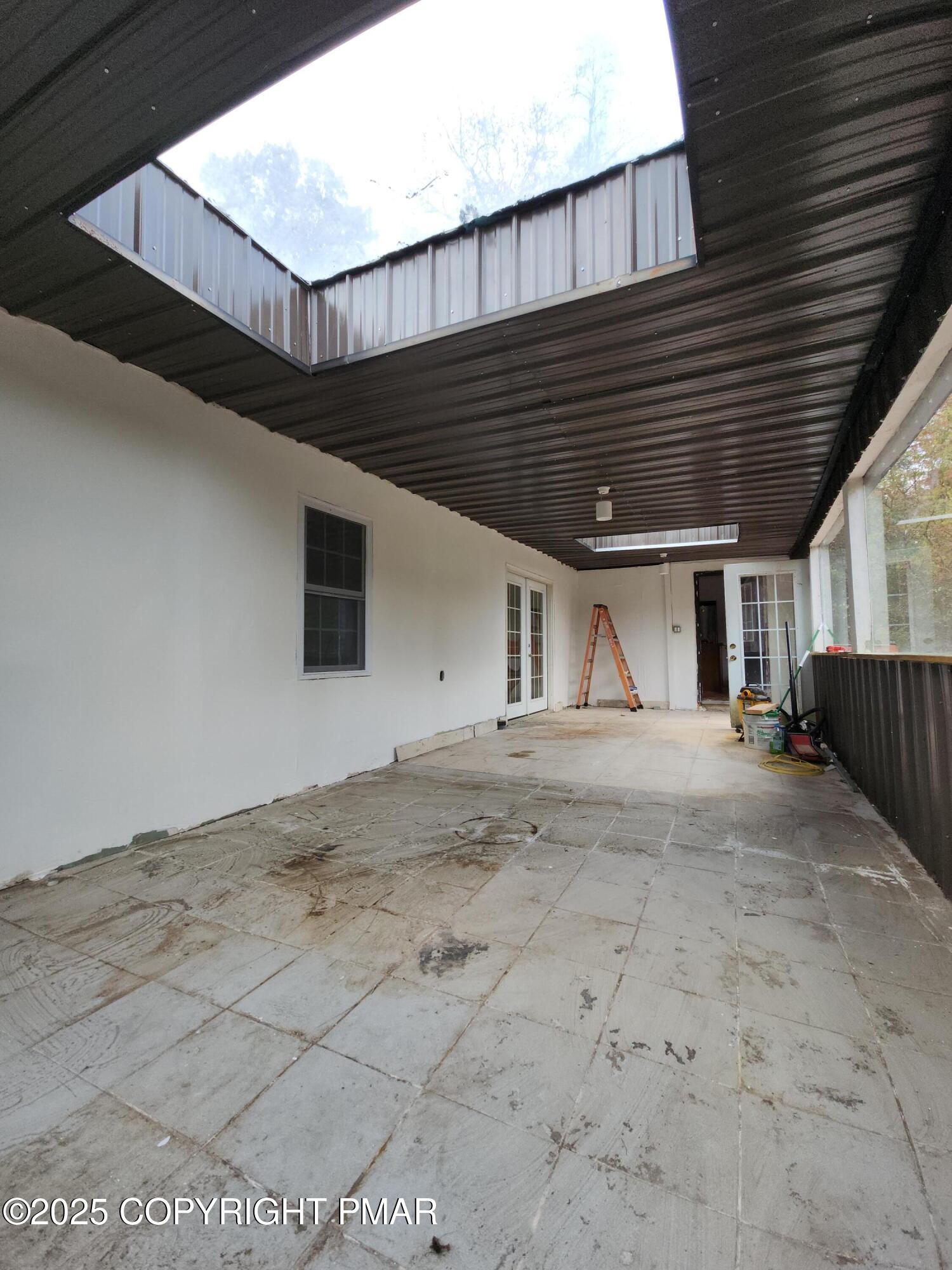 280 Coolbaugh Road East Stroudsburg, PA 18302 - Photo 11 of 40 a view of a house with a wooden roof