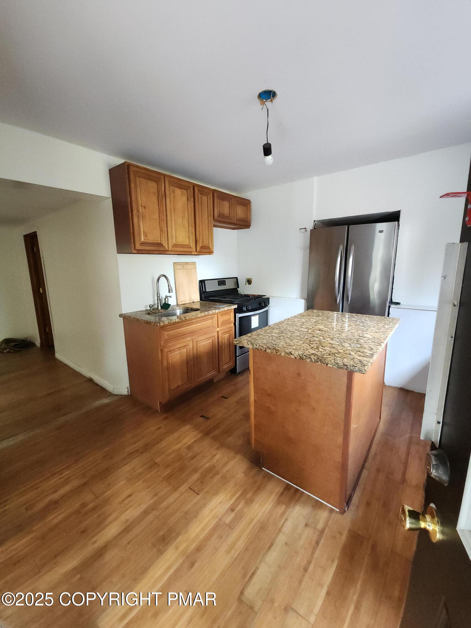 280 Coolbaugh Road East Stroudsburg, PA 18302 - Photo 14 of 40 a bed room with a bed and a chair