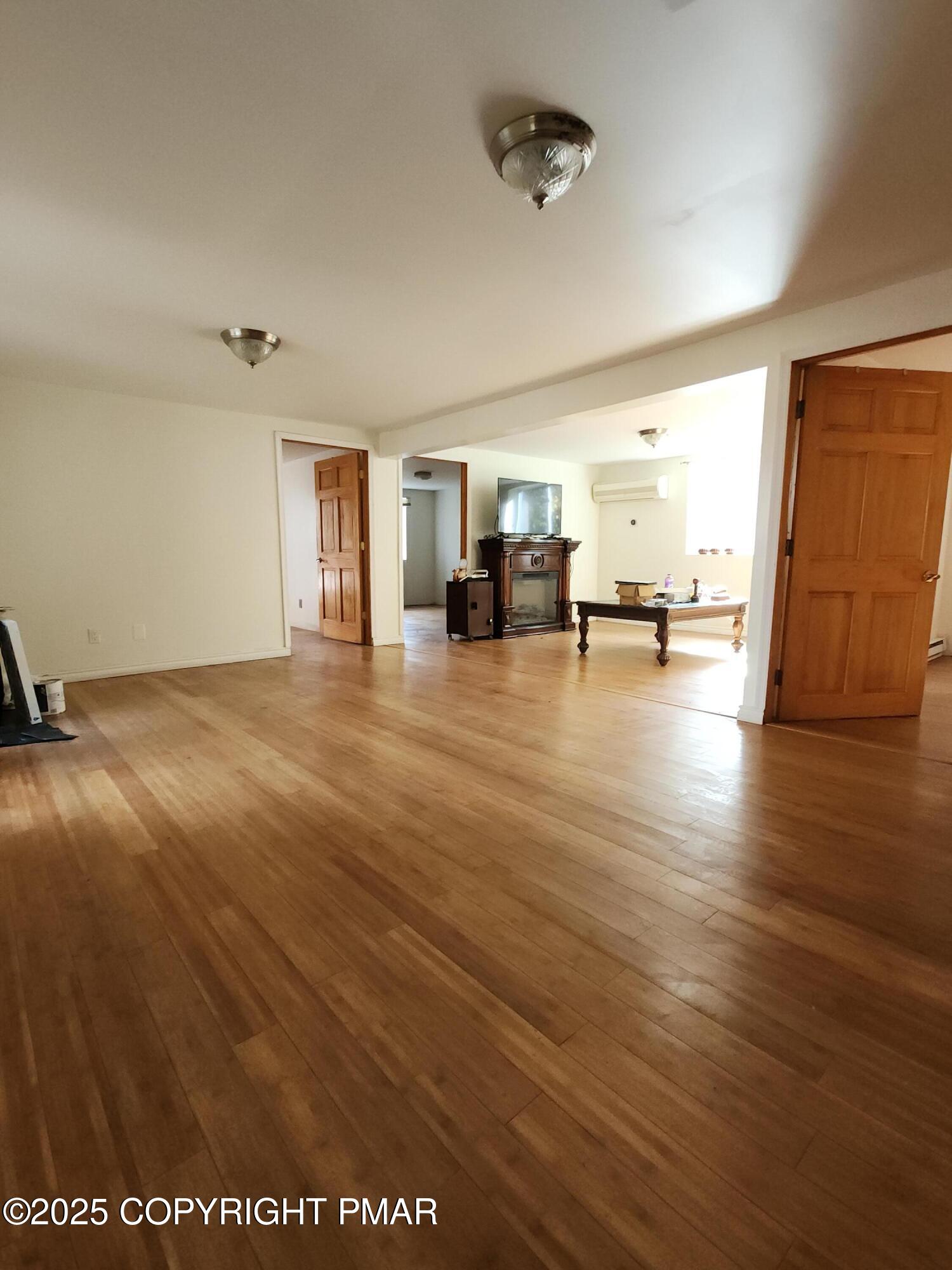 280 Coolbaugh Road East Stroudsburg, PA 18302 - Photo 17 of 40 a view of a livingroom with wooden floor