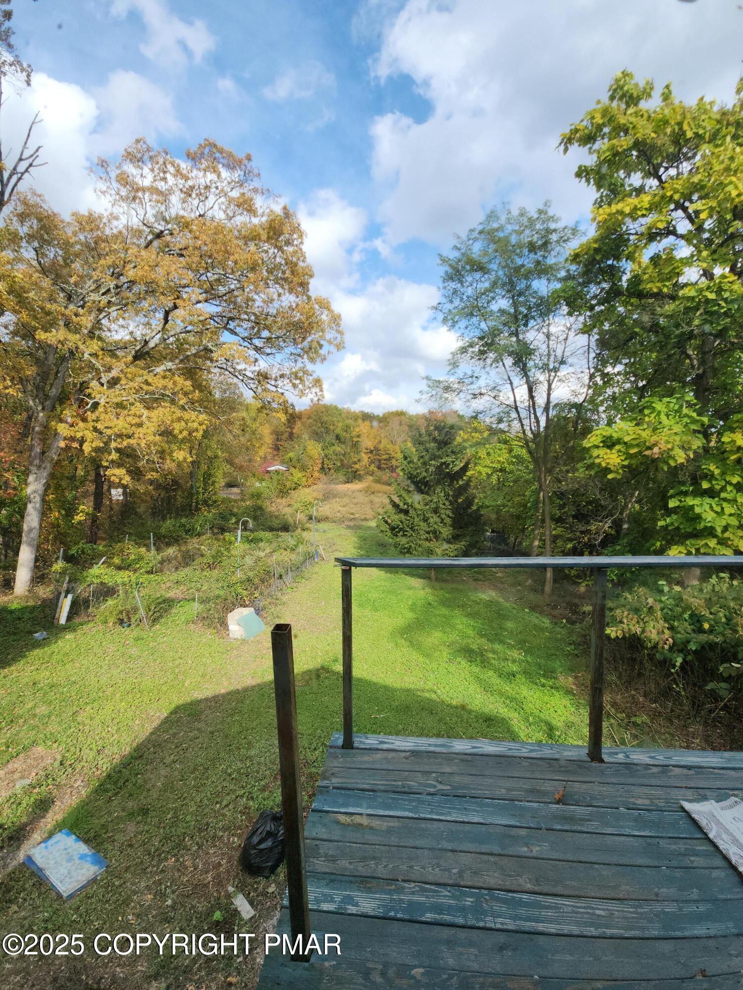 280 Coolbaugh Road East Stroudsburg, PA 18302 - Photo 36 of 40 a view of a lake with a yard