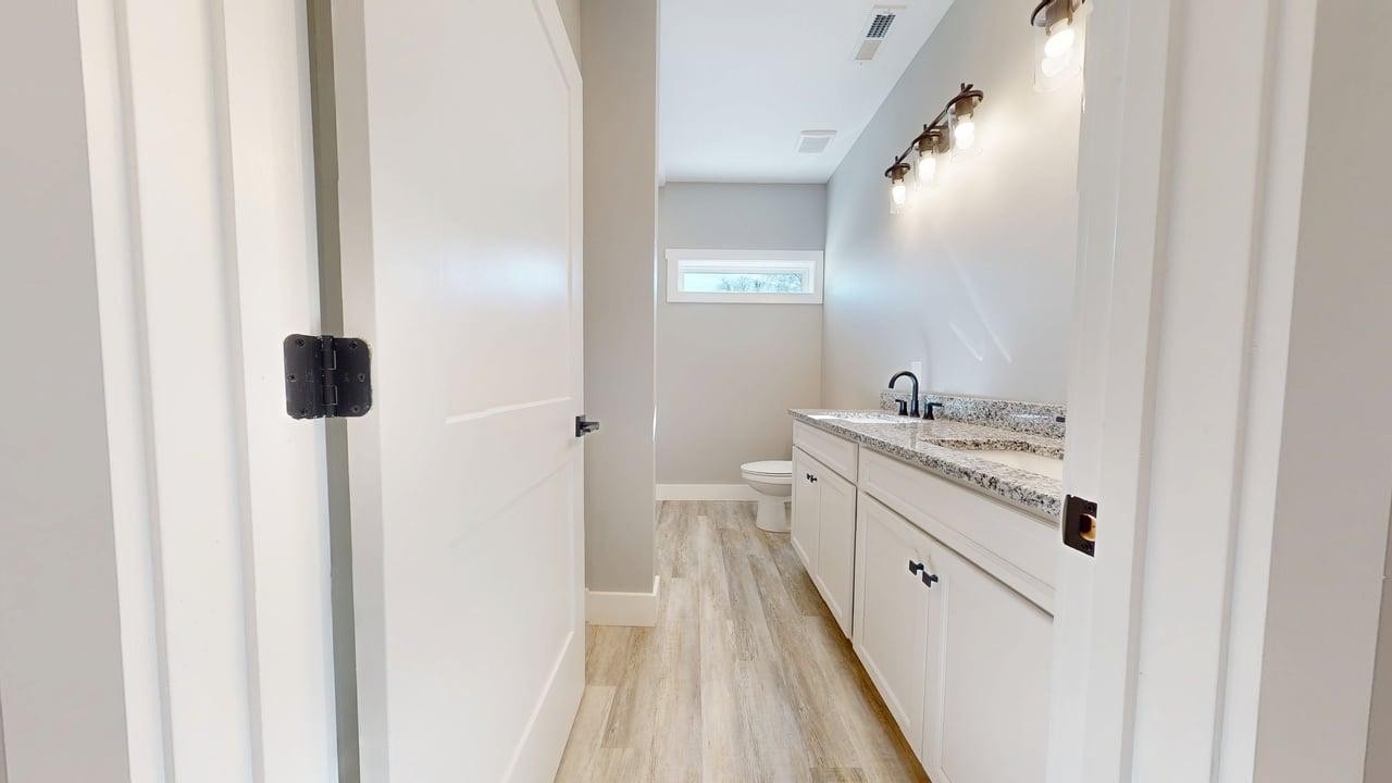 1490 Highway 100 Centerville, TN 37033 - Photo 16 of 28 a kitchen with a stove and a refrigerator
