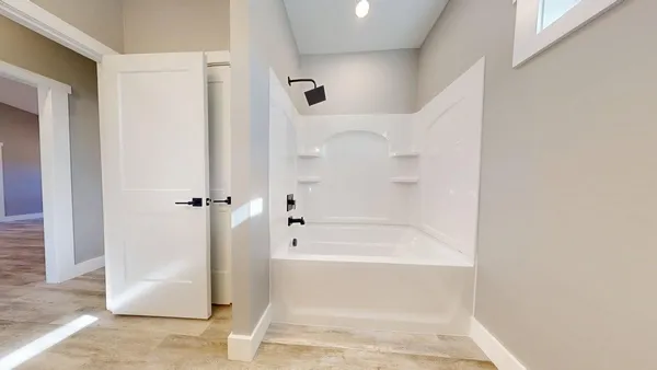 a bathroom with a bathtub