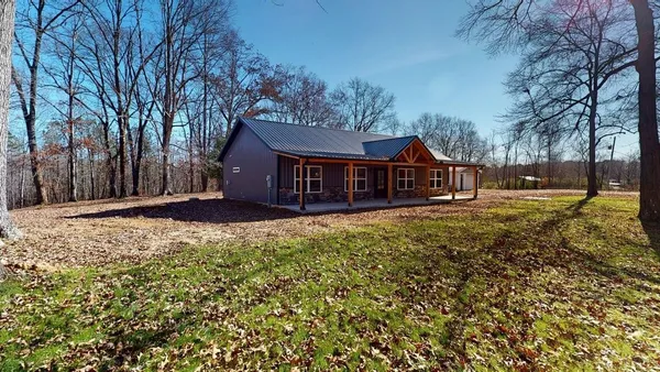 a house view with a garden space
