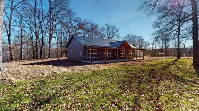 a house view with a garden space