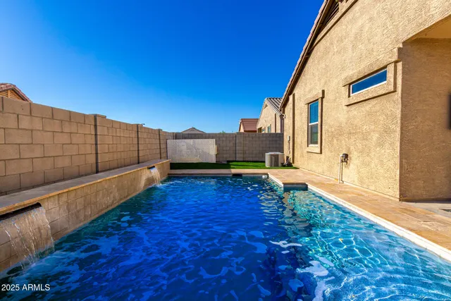 a view of a back yard with an outdoor space