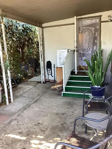 a room with gym equipment and a large window