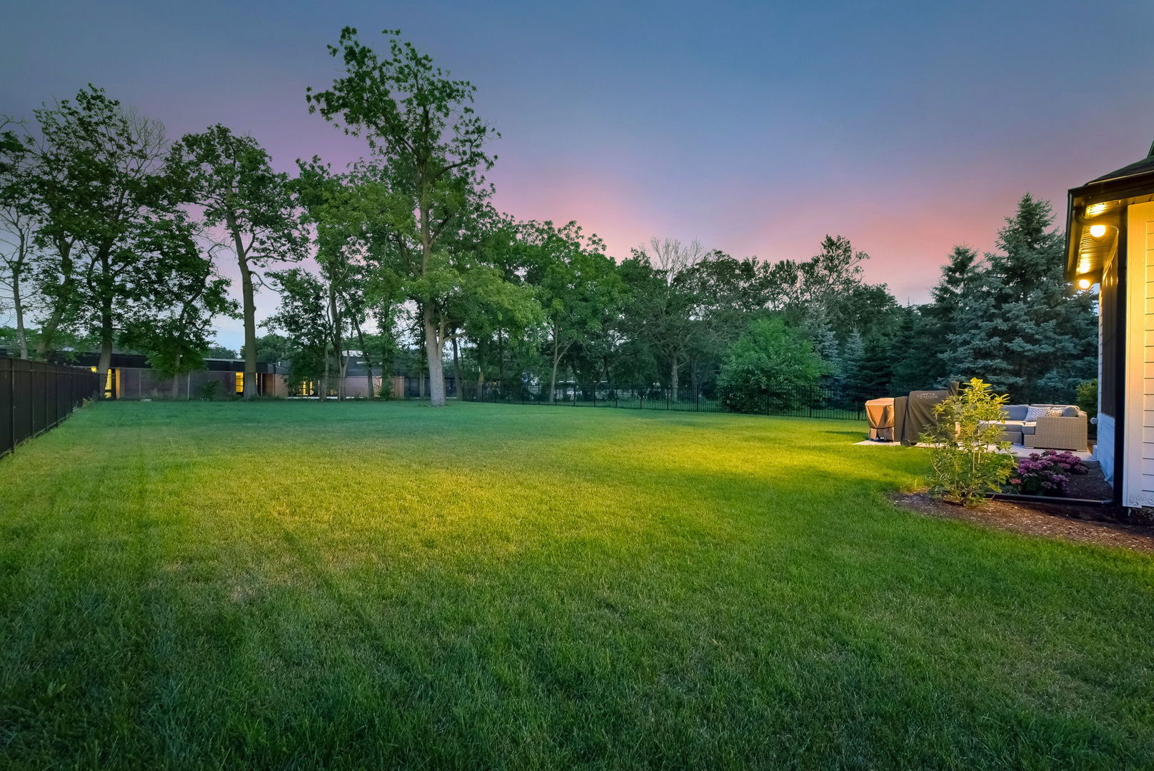 N337 Herrick Drive Wheaton, IL 60187 - Photo 33 of 37 a view of a green field with trees in the background