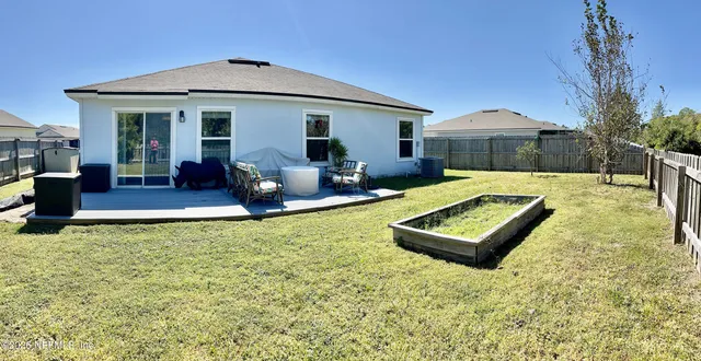 a view of a backyard with a slide