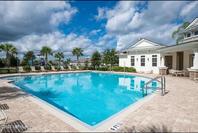 a view of swimming pool with a garden
