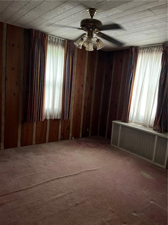 213 Card Avenue Wilmerding, PA 15148 - Photo 14 of 31 an empty room with windows and furniture