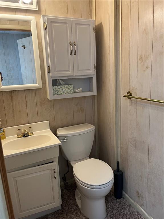 213 Card Avenue Wilmerding, PA 15148 - Photo 6 of 31 a bathroom with a sink a toilet and a mirror