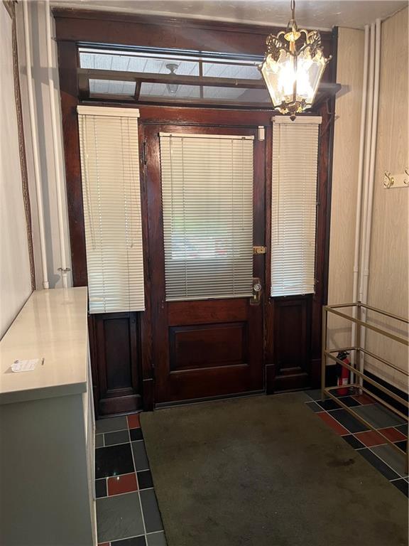 213 Card Avenue Wilmerding, PA 15148 - Photo 10 of 31 a view of entryway with a front door and wooden floor