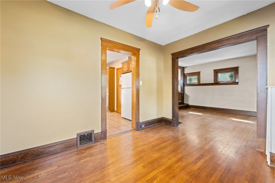 3918 Bluestone Road Cleveland Heights, OH 44121 - Photo 5 of 27 Dining room with light hardwood / wood-style flooring and ceiling fan