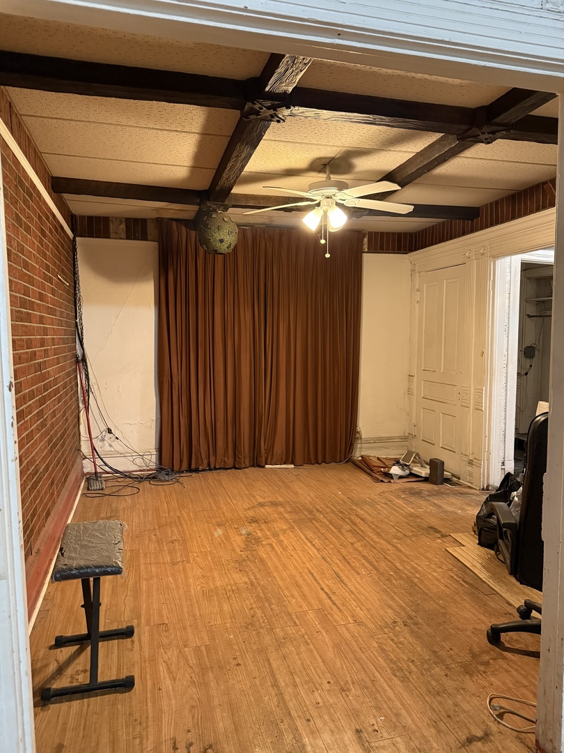 7006 South East End Avenue Chicago, IL 60649 - Photo 3 of 26 a view of a room with gym equipment