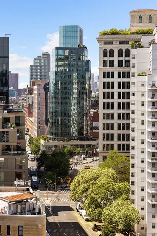 a view of a city that has tall buildings