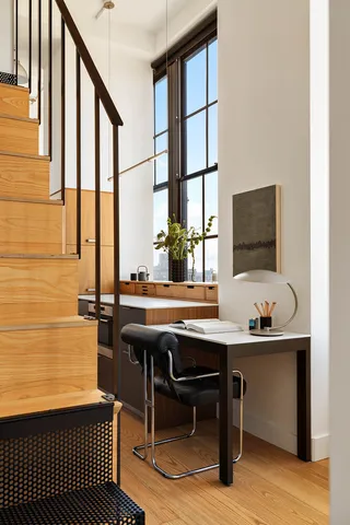 a kitchen with appliances cabinets and a sink