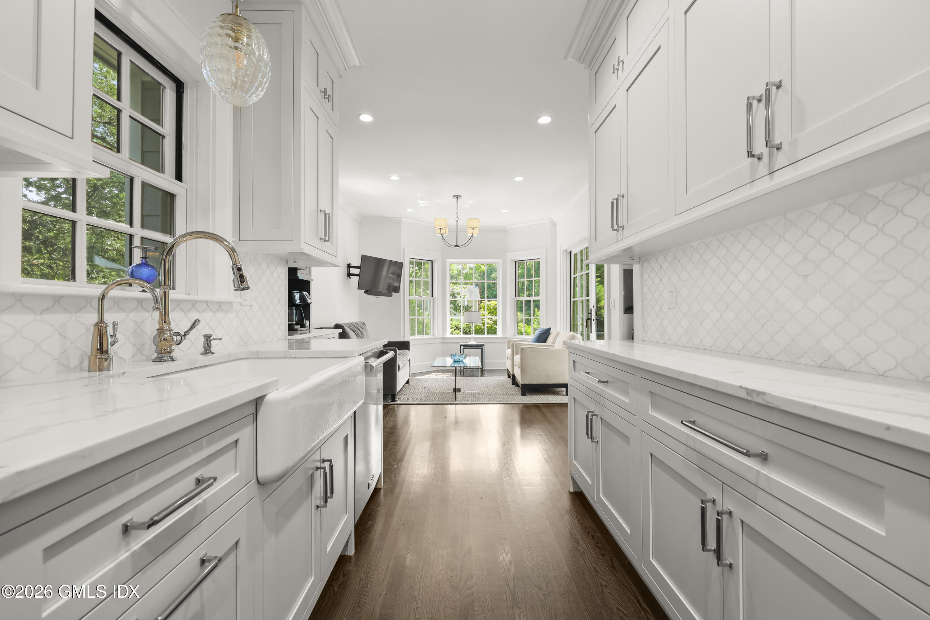 21 Spring Street Riverside, CT 06878 - Photo 5 of 27 kitchen through to family area