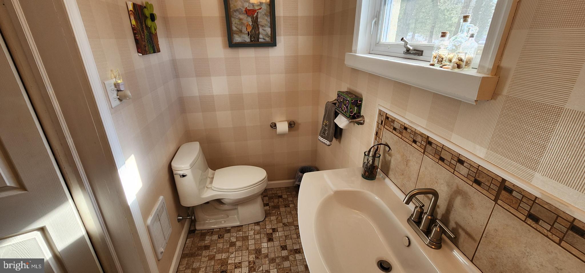 587 Moreland Road Huntingdon Valley, PA 19006 - Photo 16 of 20 Powder room with tile accents.