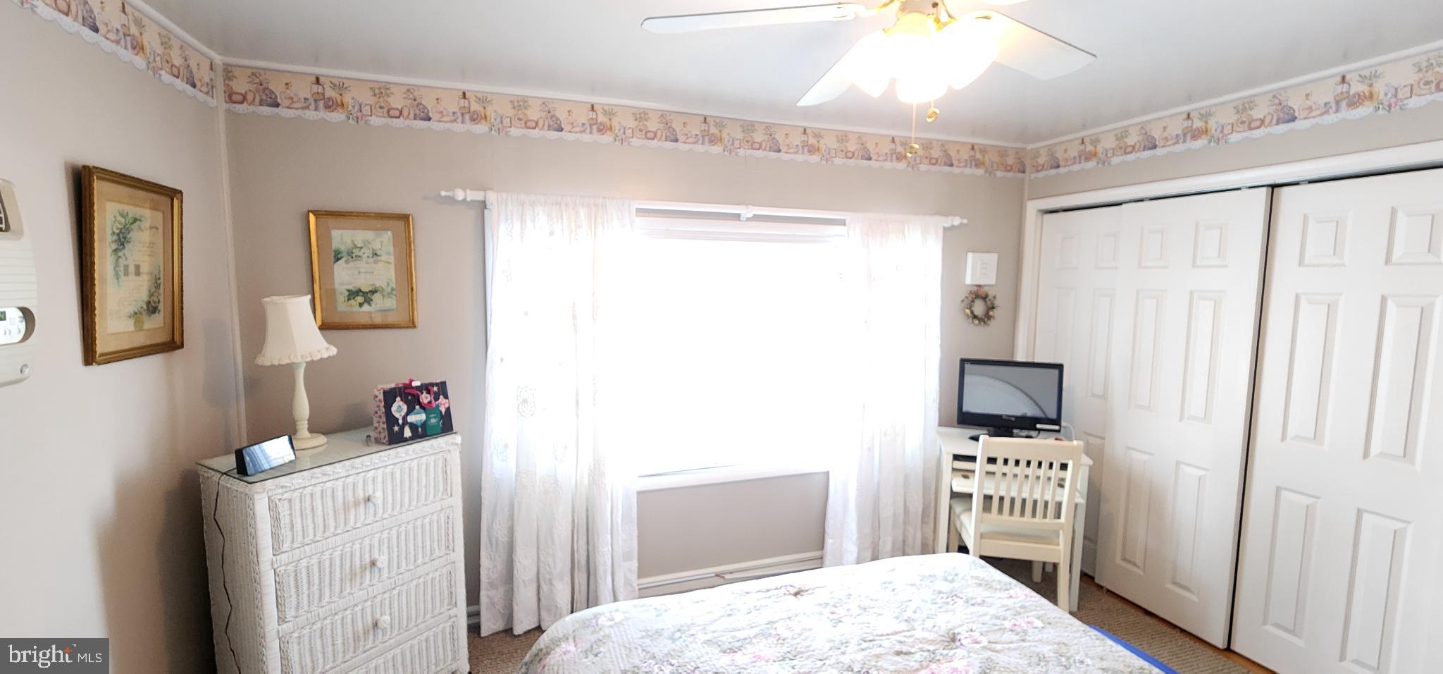 587 Moreland Road Huntingdon Valley, PA 19006 - Photo 9 of 20 Cozy bedroom with natural light and charm.