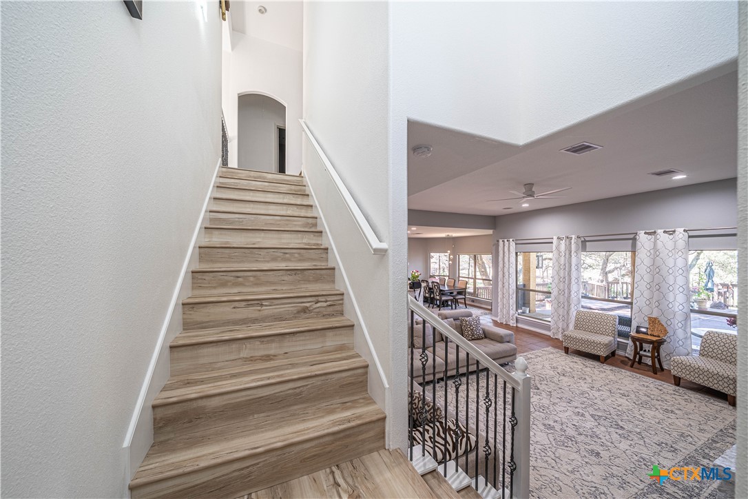 519 Long Meadow Spring Branch, TX 78070 - Photo 15 of 33 a view of a livingroom with furniture and staircase