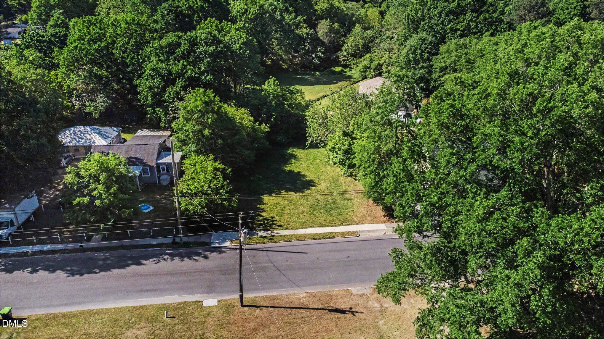 315 Cook Street Wendell, NC 27591 - Photo 14 of 22 a backyard of a house with lots of green space