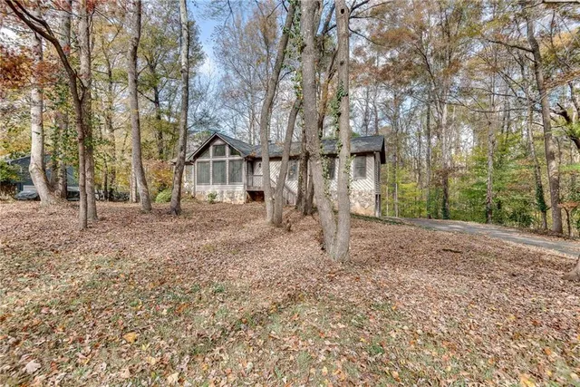 a backyard of a house with lots of green space