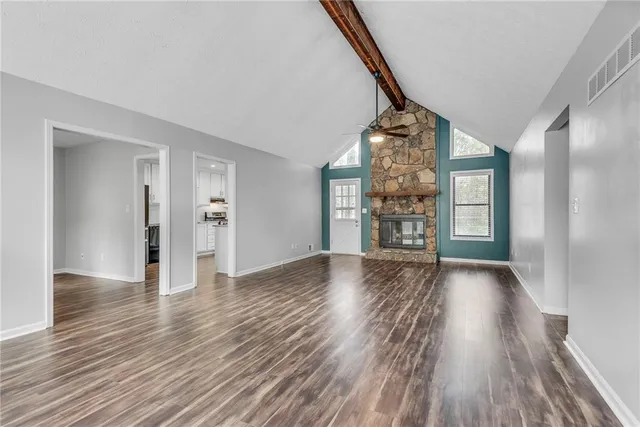 a view of an entryway door with wooden floor
