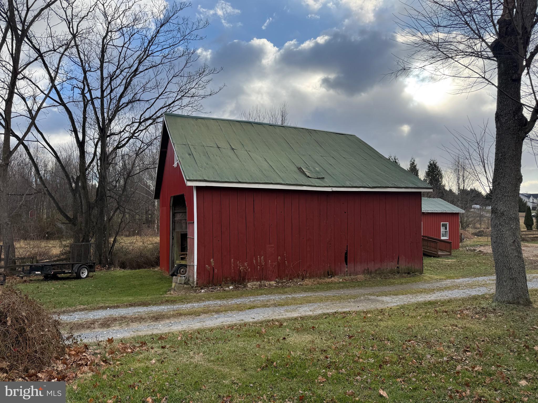 4047 Ridge Road Westminster, MD 21157 - Photo 17 of 33 a front view of house with yard and trees
