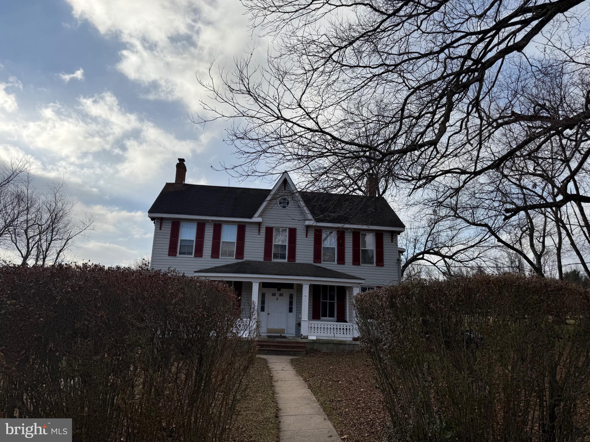 4047 Ridge Road Westminster, MD 21157 - Photo 30 of 33 a house that has tree in front of it