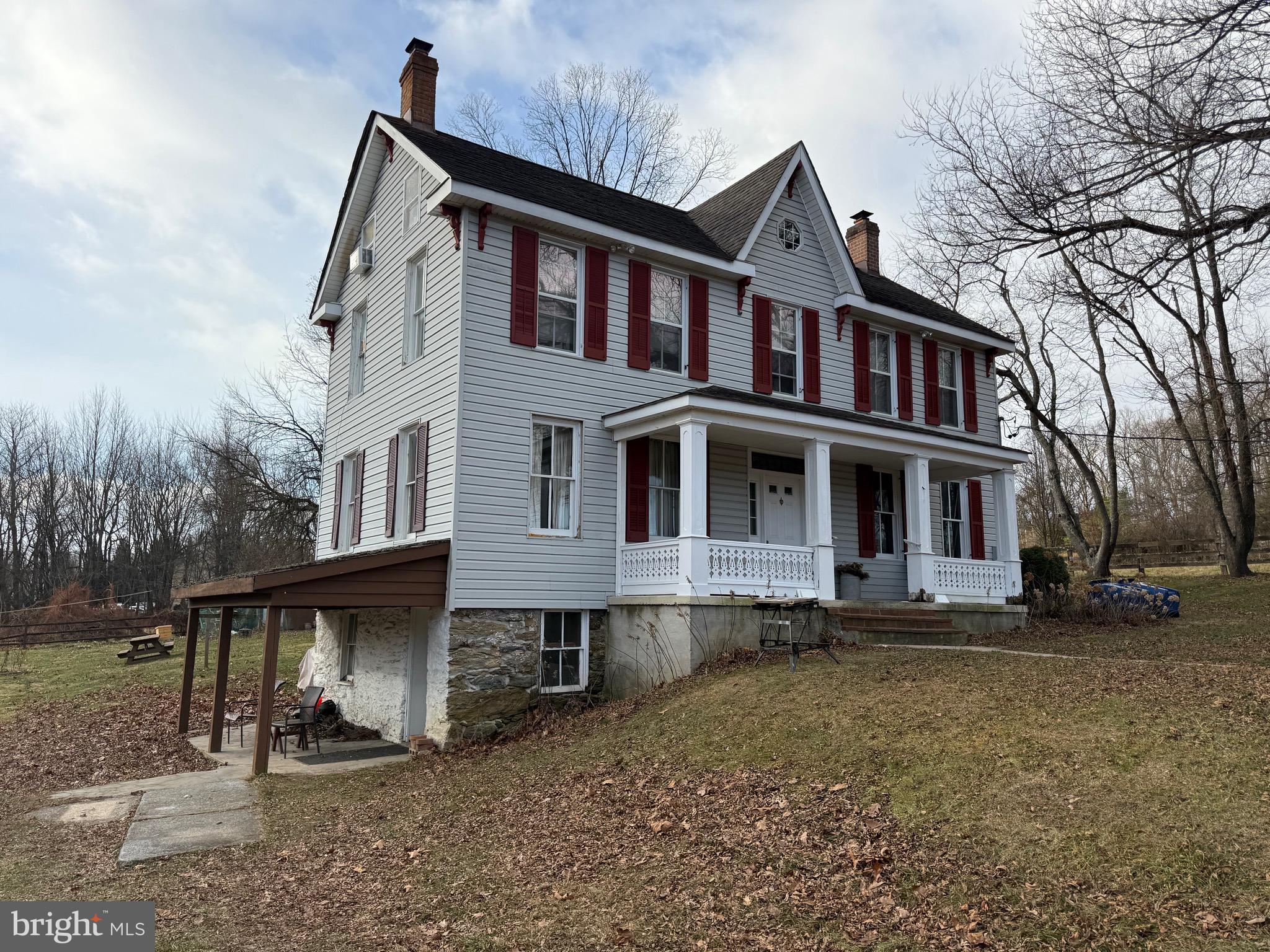 4047 Ridge Road Westminster, MD 21157 - Photo 3 of 33 a front view of a house with a yard