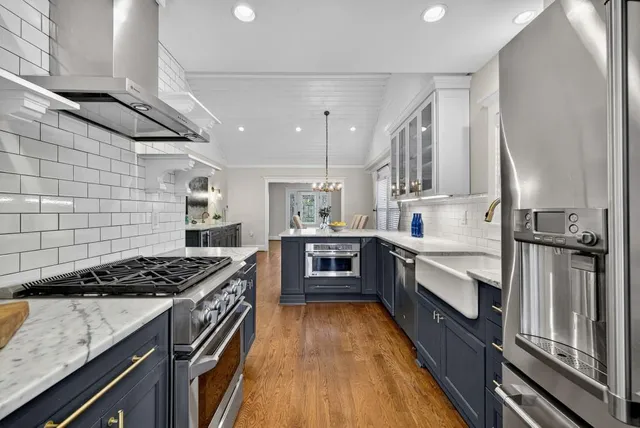 a view of backyard of house with outdoor seating