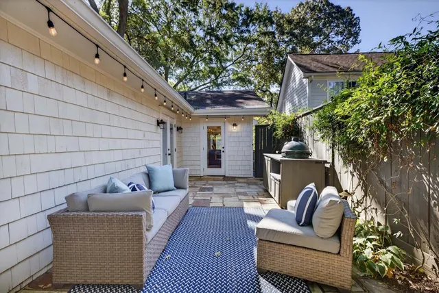 a room with a bed and a table in it