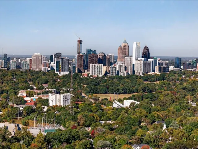 a view of city and a tall buildings